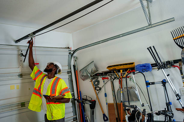 Professional Garage Door technician working in Norton Center, MA
